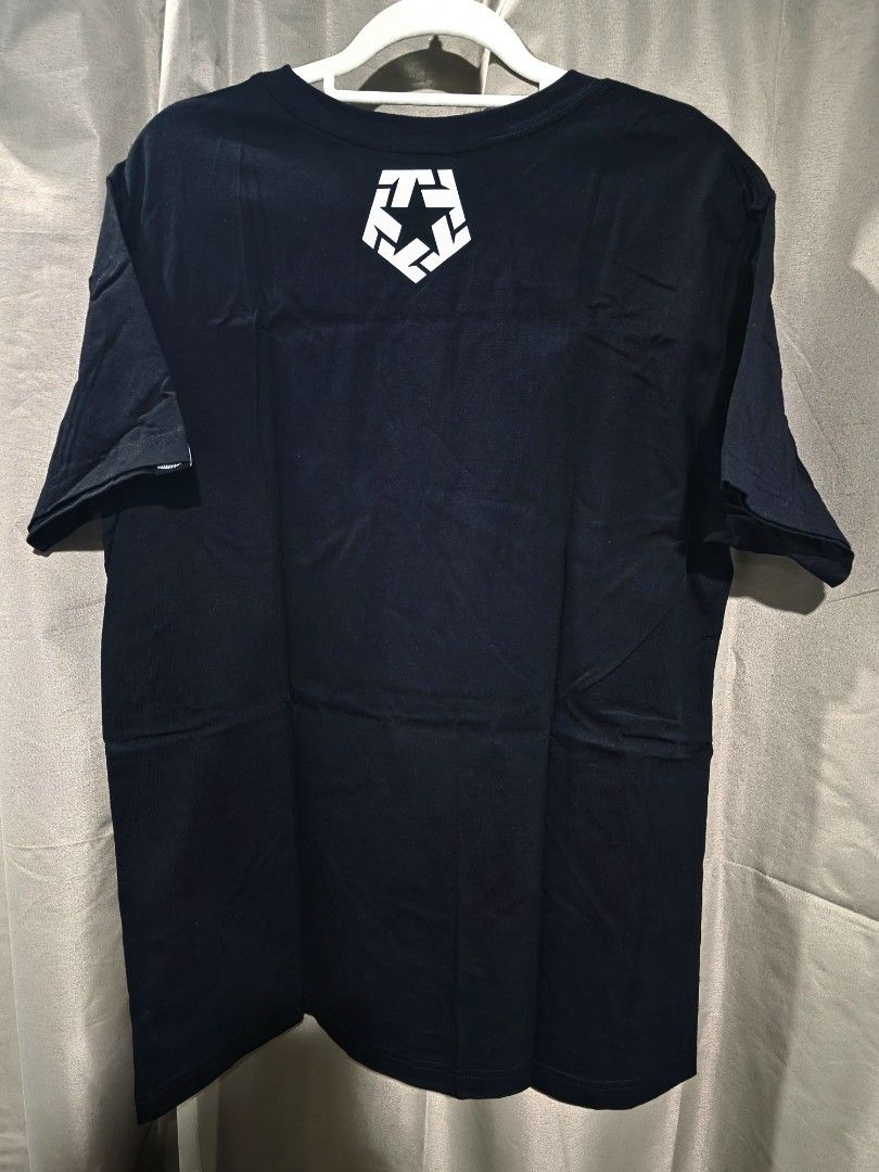Tribal Road Trip XL (Category: Tshirts & Polo Shirts ) located in Santa Rosa. Submitted by rowhell09 (Listing ID 1467777466, Image 2). Description: Dutdutan Road Trip XL, Excellent Condi 💸700 MOD. LBC MOP. BDO, GCASH LOC. NUEVA ECIJA Meet up. Santa rosa Nueva Ecija - Color: Black - Design: Front features a detailed black & white clown girl holding a skull wand; small tribal star logo near the back collar - Fit: Short sleeves, crew neck - Conditi