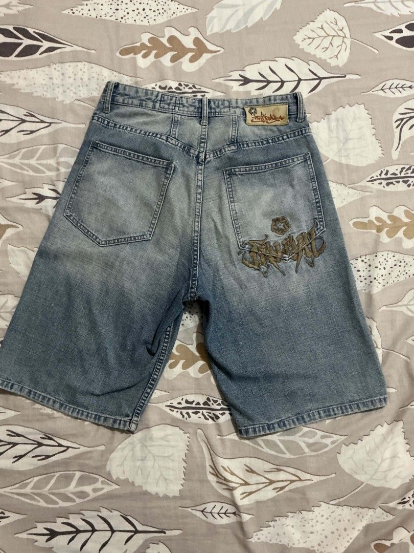 Tribal Vintage Denim Jorts (Category: Shorts) located in Batangas. Submitted by issaloki_ (Listing ID 1467754478, Image 2). Description: - Brand: Tribal early 2000s - Style: Light wash denim jorts / baggy fit - Size: 29 (waist label) can fit to 30 - Details: Large embroidered logo on back pocket, multiple pockets, and belt loops - Vibe: Classic Y2K streetwear 849 + shipping fee.