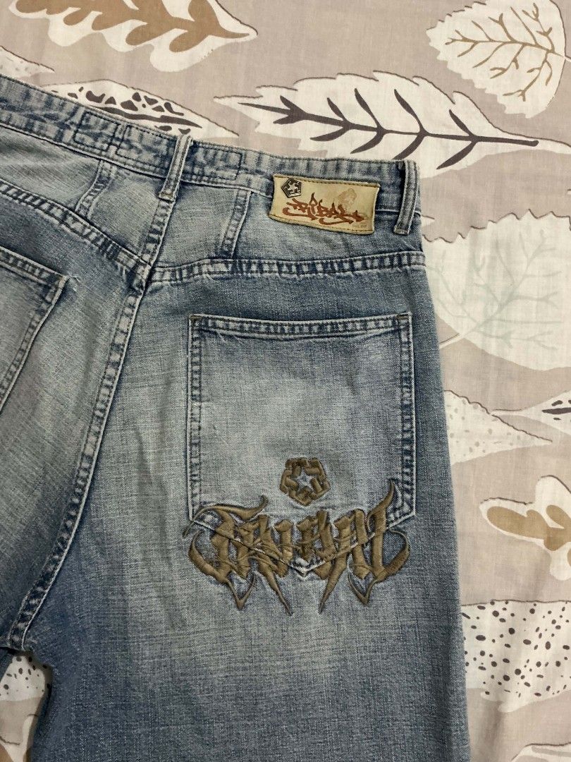 Tribal Vintage Denim Jorts (Category: Shorts) located in Batangas. Submitted by issaloki_ (Listing ID 1467754478, Image 1). Description: - Brand: Tribal early 2000s - Style: Light wash denim jorts / baggy fit - Size: 29 (waist label) can fit to 30 - Details: Large embroidered logo on back pocket, multiple pockets, and belt loops - Vibe: Classic Y2K streetwear 849 + shipping fee.