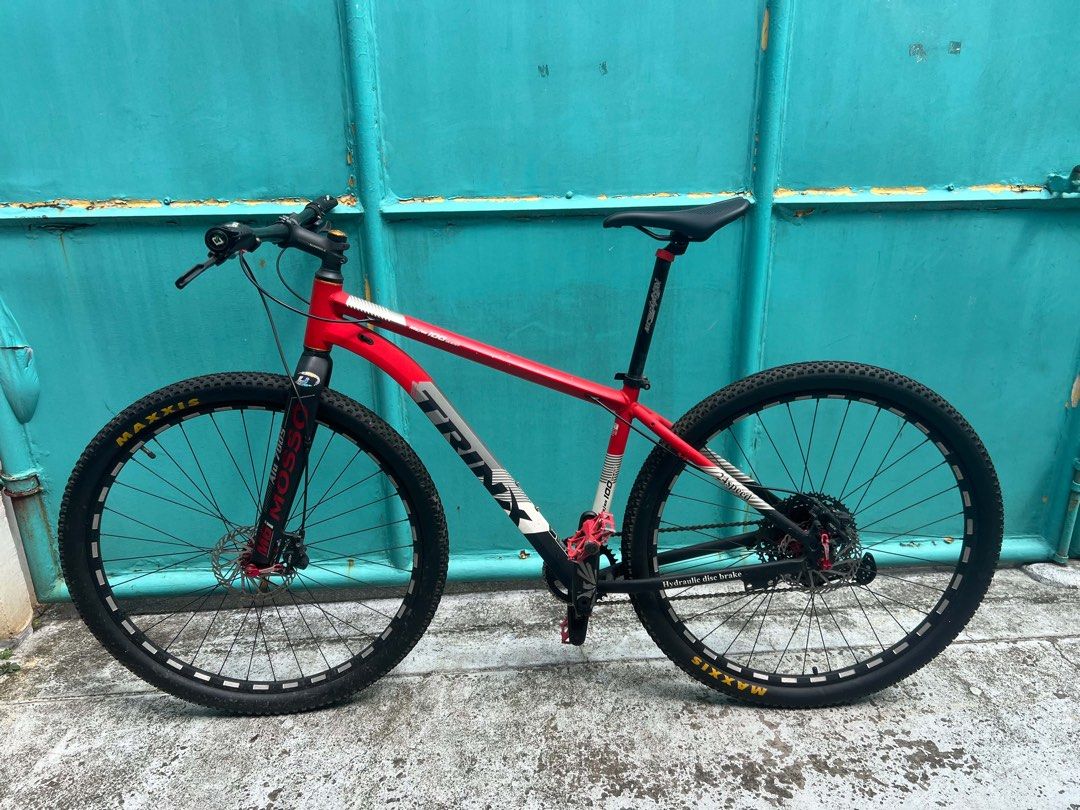 TRINX Majes 100 Quest Mountain Bike (Category: Bicycles) located in Manila. Submitted by zee.ee07 (Listing ID 1467780526, Image 1). Description: TRINX MAJES 100 QUEST CUSTOM MTB PRICE: ₱11,000 Selling my custom-built Trinx MTB with upgraded components. Great for daily rides, fitness, and recreational cycling. BIKE SPECS & COMPONENTS * Frame: Trinx Majes 100 Quest * Groupset: Shimano Deore M6100 1x12-speed * Cassette: 50T * Crankset: HASSNS GXP wi