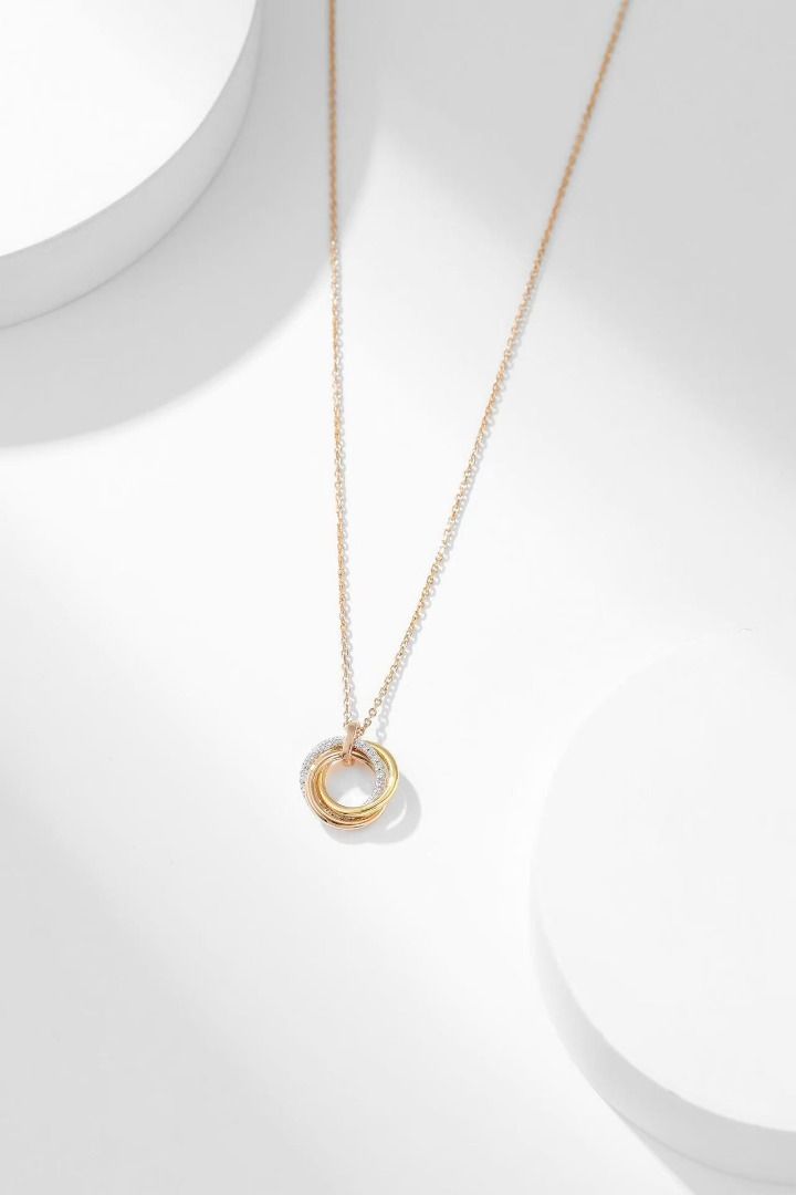 Triple Interlocking Ring Pendant Necklace Rose Gold (Category: Necklaces) located in Navotas City. Submitted by stevensmit50068 (Listing ID 1467673168, Image 1). Description: - Elegant rose gold-tone chain - Features three interlocking pendant rings - One ring beautifully encrusted with clear crystals - Delicate and lightweight design - Secure clasp closure - Perfect minimalist accessory for daily wear.