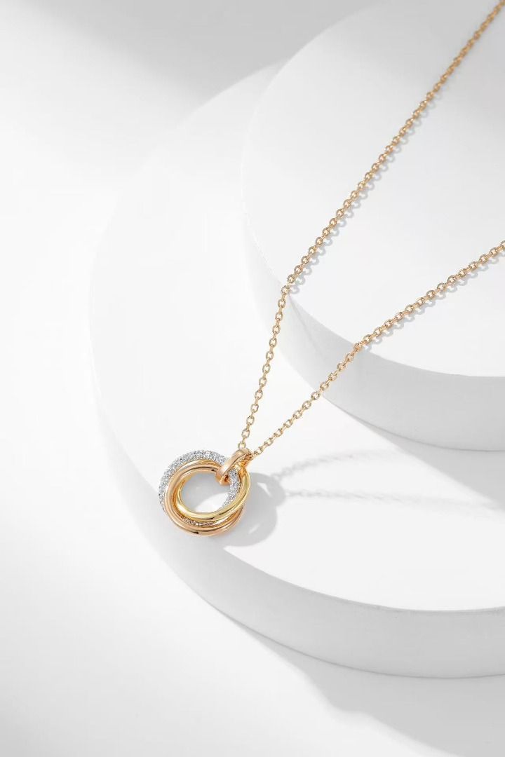 Triple Interlocking Ring Pendant Necklace Rose Gold (Category: Necklaces) located in Navotas City. Submitted by stevensmit50068 (Listing ID 1467673168, Image 3). Description: - Elegant rose gold-tone chain - Features three interlocking pendant rings - One ring beautifully encrusted with clear crystals - Delicate and lightweight design - Secure clasp closure - Perfect minimalist accessory for daily wear.