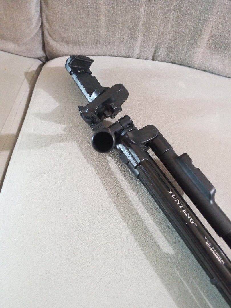 Tripod Stand - Yunteng VCT-5208RM (Category: Tripods & Monopods) located in Dasmarinas. Submitted by ellescorner_ (Listing ID 1467643723, Image 3). Description: - Brand/Model: Yunteng VCT-5208RM Tripod - Includes attached smartphone mount - Adjustable legs for versatile height settings Missing parts: - Bluetooth remote control shutter - One missing screw (but u can easily improvise) RFS: Planning to replace it with a portable one. Price is still 