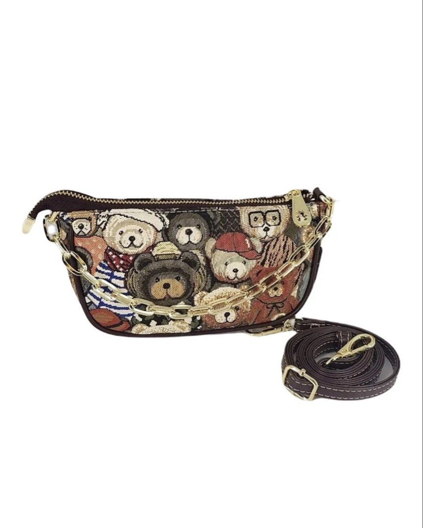 TTWN Bear Two-Way Pochette Bag (Category: Shoulder Bags) located in Las Pinas. Submitted by luxeloveph (Listing ID 1467655784, Image 1). Description: ౨ৎ Material: Canvas ౨ৎ Condition: 8/10 (body is clean just signs of usage on the hardware) ౨ৎ Dimensions: 14 x 5 x 11 cm ౨ৎ Inclusion: leather sling.