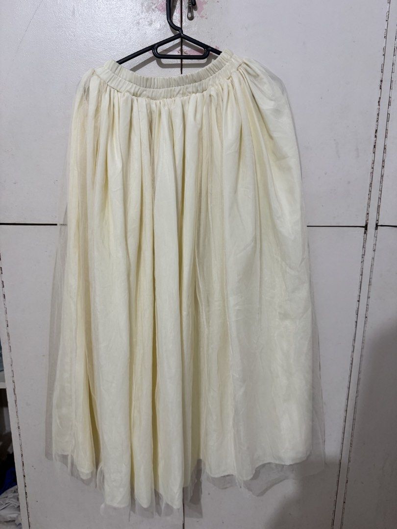 Tulle maxi skirt (Category: Skirts) located in Manila. Submitted by reicellpa20302 (Listing ID 1467744772, Image 1). Description: - Color: Cream white - Length: Ankle length - Fit: Comfy elastic waistband (very stretchy) - Material: Layered mesh fabric with full lining (not see-through) - Style: Full, flowy shape, easy to match with basic tops and sweaters - Occasion: Great for casual day outs or events Rfs: declutterring Gcash/Maribank/Chinabank
