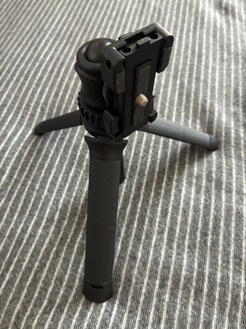 Ulanzi Extendable Selfie Stick Phone and Camera Tripod (Category: Tripods & Monopods) located in Taguig. Submitted by kitssale (Listing ID 1467644930, Image 2). Description: - Brand: Ulanzi - Color: Black - 2-in-1 Design: Easily switches between a selfie stick and a mini tripod with fold-out legs - Adjustable Height: Extends up to roughly 40 cm using a secure twist-to-lock mechanism - Versatile Mount: Built-in phone clamp features a cold shoe mou