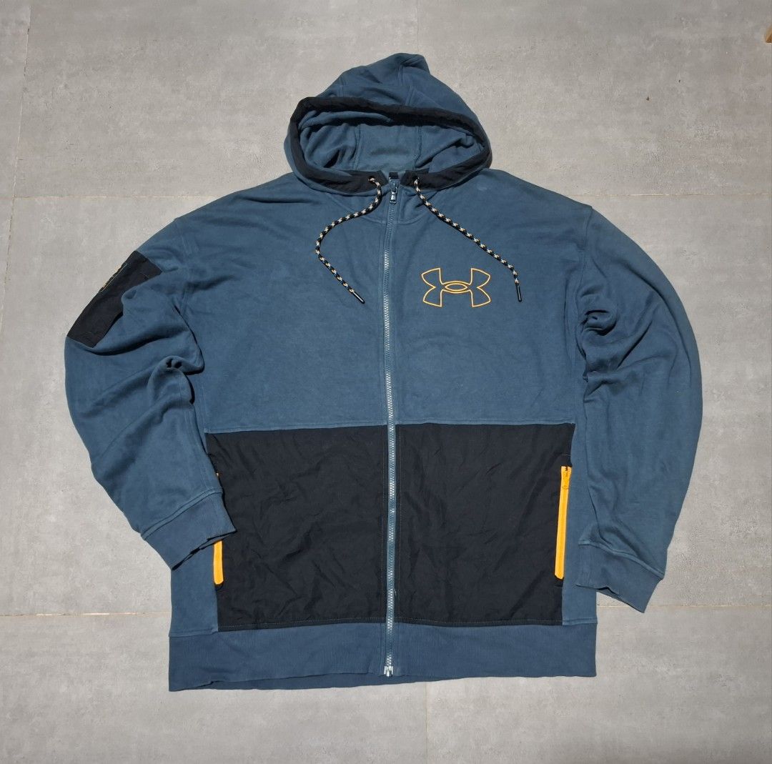 Under Armour Rival Terry Scribble Fullzip hoodie (Category: Activewear) located in Rizal. Submitted by marcothrifts (Listing ID 1467712550, Image 2). Description: Under Armour Rival Terry Scribble Fullzip hoodie Width: 23 Length: 27.5 Color rate: 9.9/10 Excellent Condition No issue • Material: French terry fabric with a smooth outer layer and a soft, warm interior. • Design Details: Contrasting black woven front panels, zippered hand pockets with