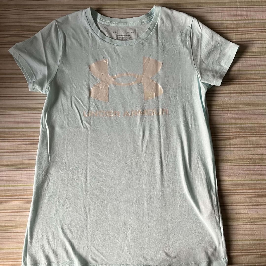 Under Armour The Classic Tee Light Blue Size L (Category: Activewear) located in Cebu City. Submitted by islanevaeh85 (Listing ID 1467641827, Image 1). Description: - Brand: Under Armour - Color: Light blue with large front logo - Size: LG (true to size) - Material: Super soft cotton and polyester blend - Fit & Style: Short sleeves, crew neck - Condition: Great pre-loved/basic piece - Ideal for: Workouts or casual days out.