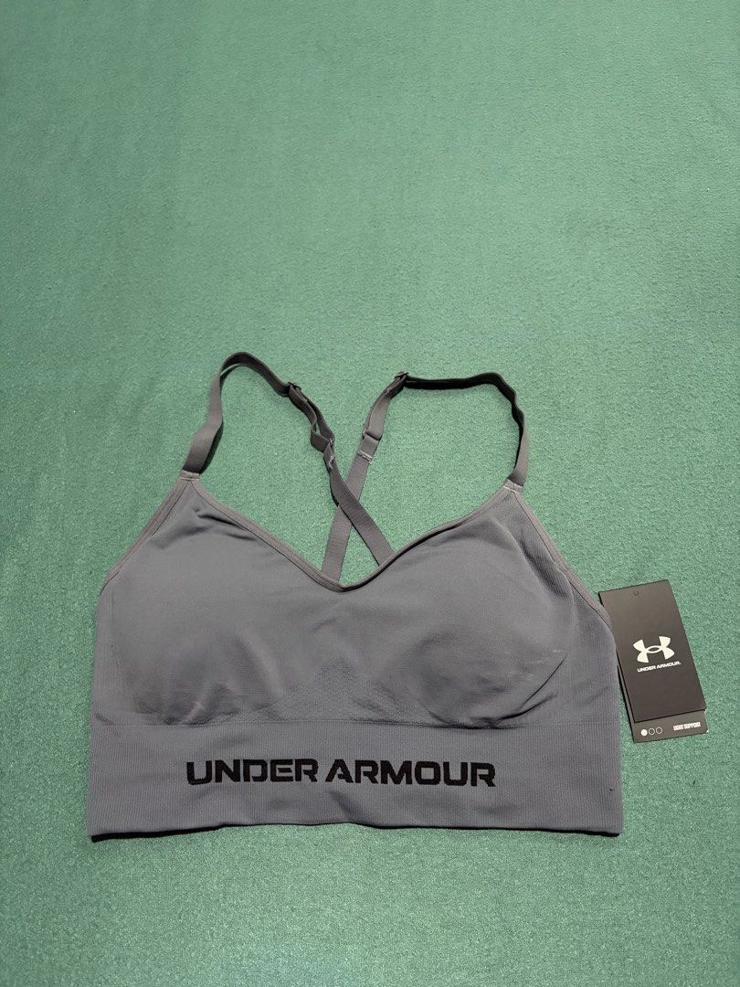Under Armour Vanish Seamless Low Bra Grey Size L (Category: Activewear) located in Guihulngan. Submitted by fbthriftgoodsniace (Listing ID 1467682002, Image 1). Description: - Brand: Under Armour - Item: Vanish Seamless Low Bra - Color: Dark Grey - Size: Large (L) - Condition: Brand new with original store tags attached - MSRP: $35 - Support: Light support style - Features: Adjustable crossover straps and ribbed elastic underband with Under Armou