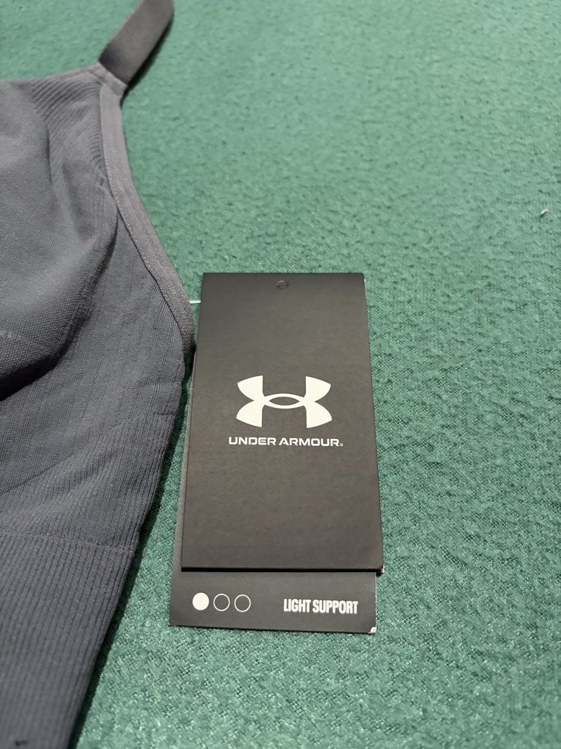 Under Armour Vanish Seamless Low Bra Grey Size L (Category: Activewear) located in Guihulngan. Submitted by fbthriftgoodsniace (Listing ID 1467682002, Image 3). Description: - Brand: Under Armour - Item: Vanish Seamless Low Bra - Color: Dark Grey - Size: Large (L) - Condition: Brand new with original store tags attached - MSRP: $35 - Support: Light support style - Features: Adjustable crossover straps and ribbed elastic underband with Under Armou