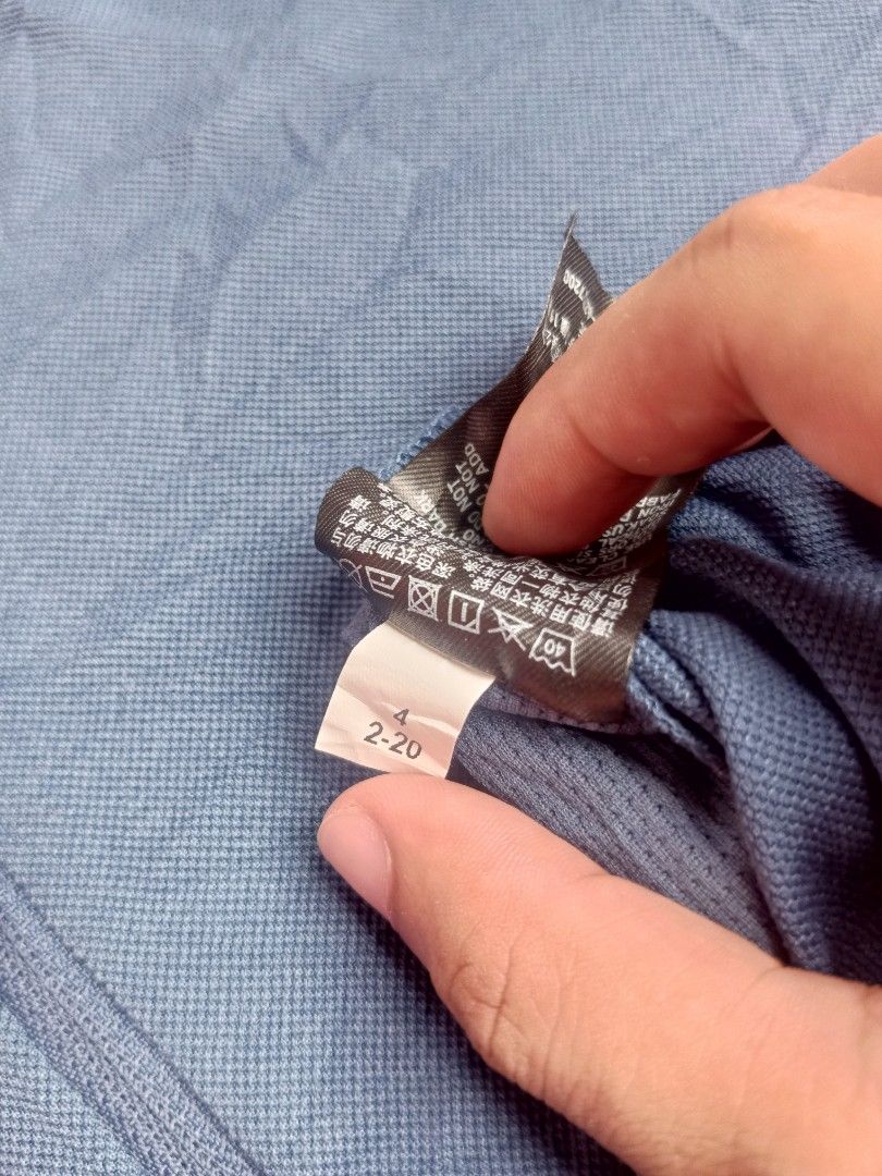 Uniqlo (Category: Activewear) located in Bacolod City. Submitted by jazzteeeyyynn (Listing ID 1467603734, Image 3). Description: UNIQLO x Theory DRY-EX half-zip polo shirt Blue💙 Excellent Condition ✅ Complete Tags ✅ Width:20 Length: 27 Size Large Location: Bacolod City.