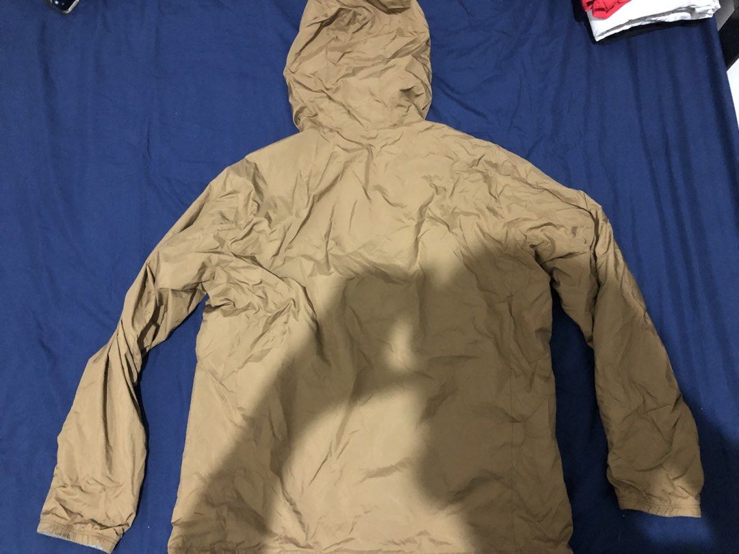 Uniqlo Reversible Brown Grey Hooded Jacket (Category: Coats, Jackets and Outerwear) located in Manila. Submitted by janmichael26601 (Listing ID 1467698509, Image 2). Description: - Two-way design in brown and heather grey - Full zip closure up the front - Attached hood with adjustable drawstrings - Lightweight fabric, ideal for layering - Standard slip pockets on both sides.