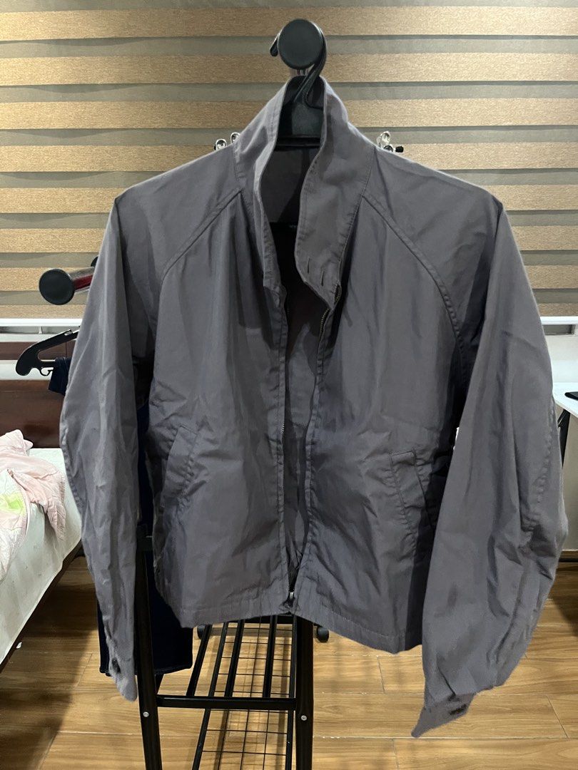 Uniqlo U Gray Zip Jacket Size S (Category: Coats, Jackets and Outerwear) located in Makati City. Submitted by grizzlybear95 (Listing ID 1467730360, Image 1). Description: - Brand: Uniqlo U - Item: Zip Jacket - Color: Dark Gray - Size: Small (S) - Material: Cotton and nylon blend - Design: Front zipper closure, stand collar, raglan sleeves, and side pockets - Origin: Made in China - Condition: Clean inside and out, well-maintained.