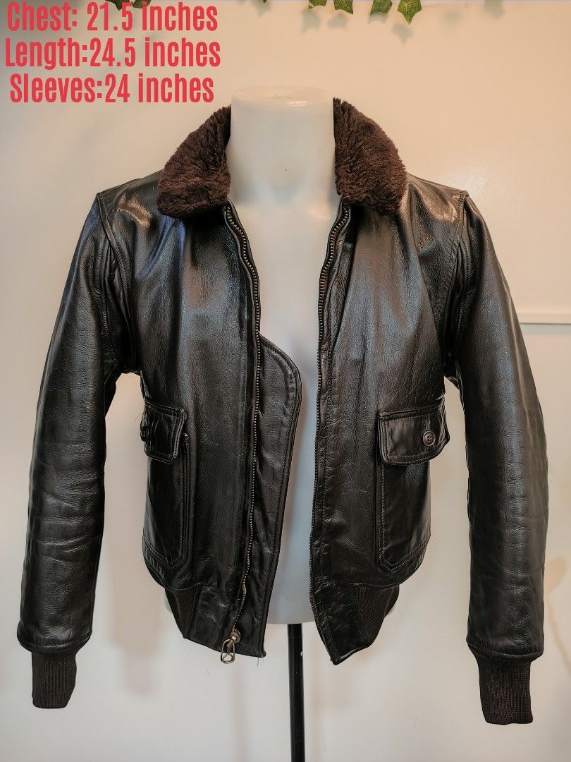 USN Vintage Leather Bomber Jacket with Shearling Collar (Category: Coats, Jackets and Outerwear) located in La Trinidad. Submitted by padasem_kadi (Listing ID 1467643899, Image 1). Description: Genuine leather bomber jacket in dark brown. Plush brown shearling collar. Ribbed cuffs and hem keep the wind out. Heavy-duty Scovill zipper works smoothly. Dual front flap pockets with button closures. Chest measures 21.5 inches, length is 24.5 inches, an