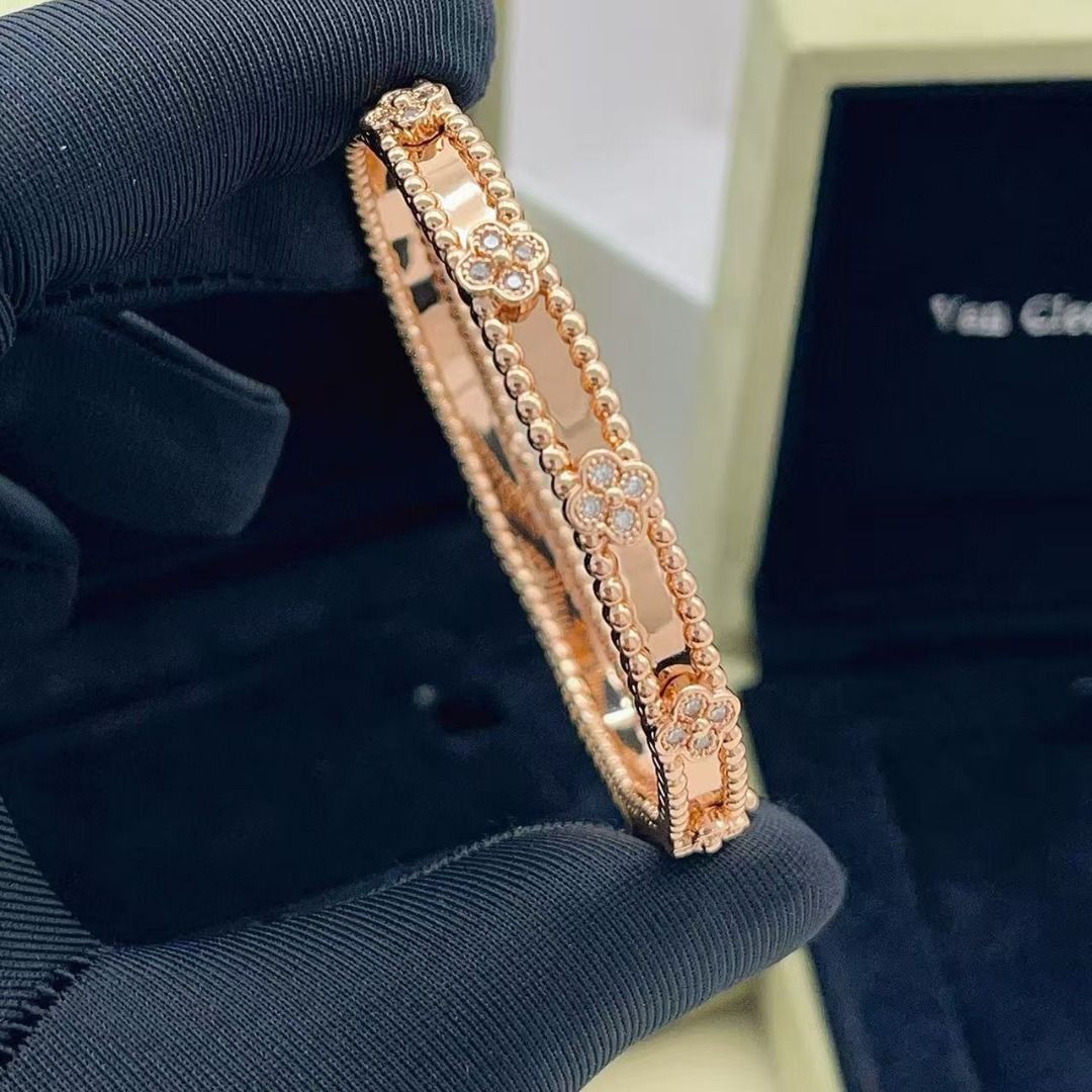 Van Cleef & Arpels Rose Gold Alhambra Bracelet (Category: Bracelets) located in Cavite. Submitted by gobangblog80903 (Listing ID 1467656658, Image 1). Description: - Brand: Van Cleef & Arpels - Metal: Rose gold - Design: Delicate clover motifs with small diamonds along a beaded band - Closure: Convenient hinged side closure - Inclusions: Complete with branded blue presentation box and outer packaging - Condition: Beautiful luxury jewelry piece, m