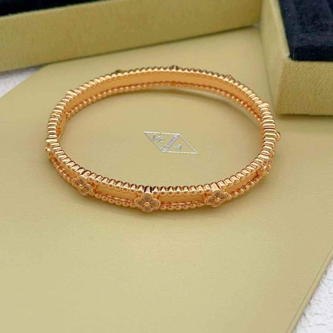 Van Cleef & Arpels Rose Gold Alhambra Bracelet (Category: Bracelets) located in Cavite. Submitted by gobangblog80903 (Listing ID 1467656658, Image 3). Description: - Brand: Van Cleef & Arpels - Metal: Rose gold - Design: Delicate clover motifs with small diamonds along a beaded band - Closure: Convenient hinged side closure - Inclusions: Complete with branded blue presentation box and outer packaging - Condition: Beautiful luxury jewelry piece, m