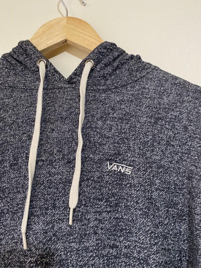 VANS,Pullover hoodie (Category: Coats, Jackets and Outerwear) located in Cavite. Submitted by jc_thrift95 (Listing ID 1467768974, Image 2). Description: - This is a dark heather blue or grey Vans pullover hoodie with a white embroidered Vans logo on the chest and a front kangaroo pocket. - Medium - L- 26 inch - W- 23.5 inch - Color rate 8/10 - See picture details for dimes. .
