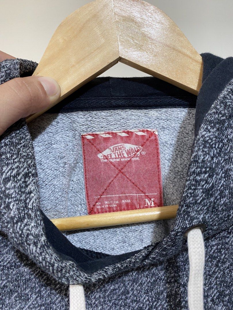 VANS,Pullover hoodie (Category: Coats, Jackets and Outerwear) located in Cavite. Submitted by jc_thrift95 (Listing ID 1467768974, Image 3). Description: - This is a dark heather blue or grey Vans pullover hoodie with a white embroidered Vans logo on the chest and a front kangaroo pocket. - Medium - L- 26 inch - W- 23.5 inch - Color rate 8/10 - See picture details for dimes. .