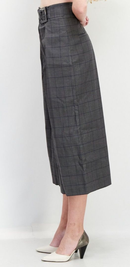 Vero Moda Grey Checked Culottes Medium Brand New with tag (Category: Skirts) located in Caloocan City. Submitted by crateandbarrel (Listing ID 1467794656, Image 3). Description: - Brand: Vero Moda - Color/Pattern: Grey with dark check pattern - Fit: High-waisted, cropped wide-leg (mid-calf length) - Details: Front pleats, integrated buckle belt, structured waistband, clean back tailoring - Style: Versatile for casual outings or smart-casual offic