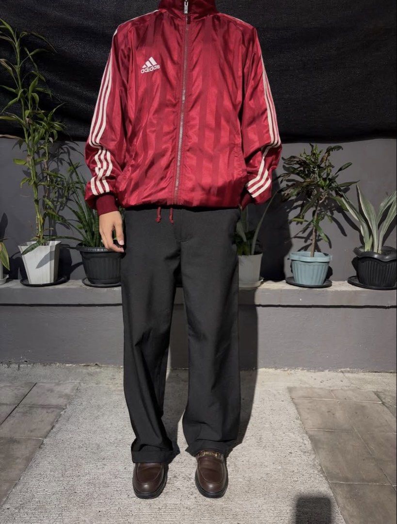 Vintage 1990 Adidas Full Zip Track Jacket (Category: Coats, Jackets and Outerwear) located in Tabaco. Submitted by vdjnefujeb (Listing ID 1467698187, Image 2). Description: - Official Tag - featuring white stripes down the sleeves and a glossy finish - Adjustable Hem - Back to Back Mullet Design - Medium to Large - 23W x 27L - Condition: 9/10 minimal color bleed RFS: decluttering.
