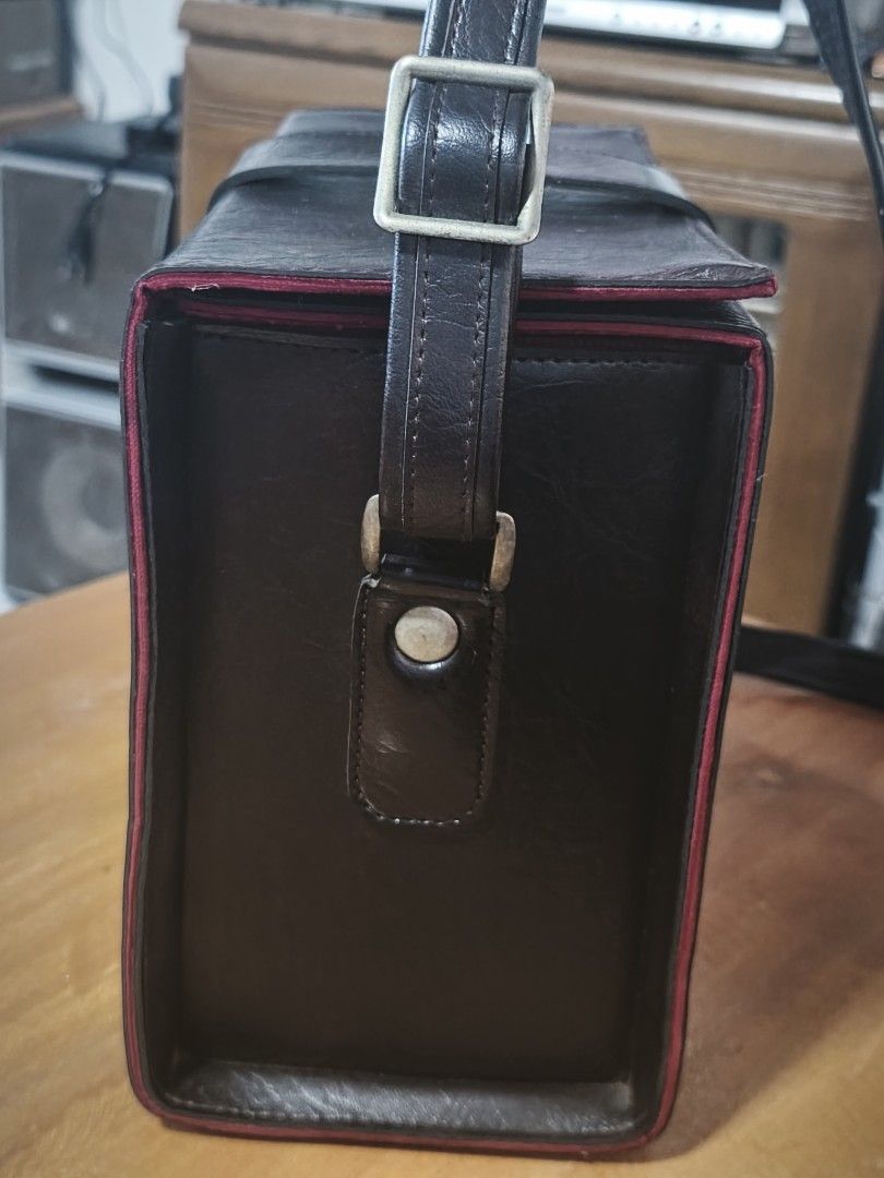 Vintage Canon Hard Leather Camera Bag/Case (Category: Camera Bags & Carriers) located in Candon. Submitted by ylocos_thrifts (Listing ID 1467611282, Image 3). Description: Vintage Canon Hard Leather Camera Bag/Case Size: H 8" x L 10.5" x W 5" Color: Brown Good Condition Sign of usage.