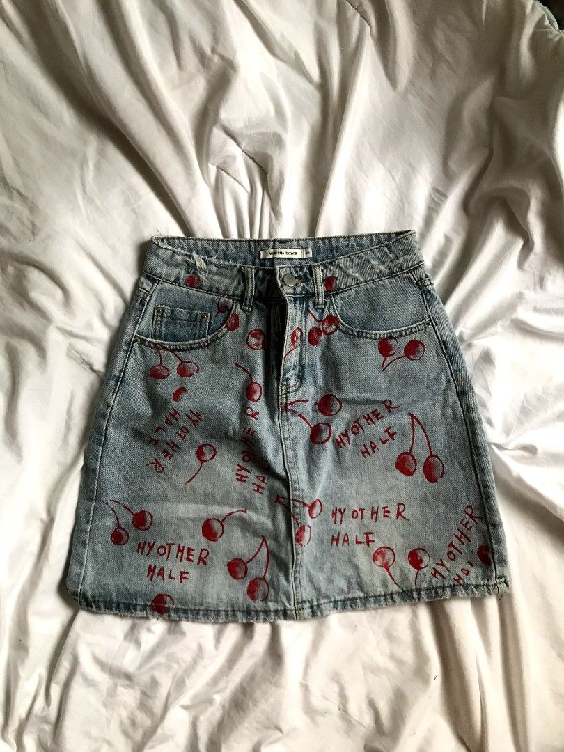 Vintage denim cherry skirt (Category: Skirts) located in Cavite. Submitted by maica_ (Listing ID 1467612695, Image 1). Description: waist: 25 length: 15 no flaws/stain dm to haggle and to sejd a when worn.