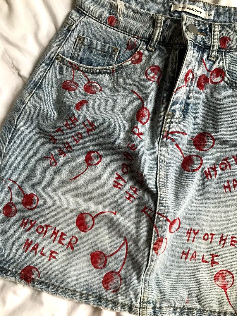 Vintage denim cherry skirt (Category: Skirts) located in Cavite. Submitted by maica_ (Listing ID 1467612695, Image 2). Description: waist: 25 length: 15 no flaws/stain dm to haggle and to sejd a when worn.