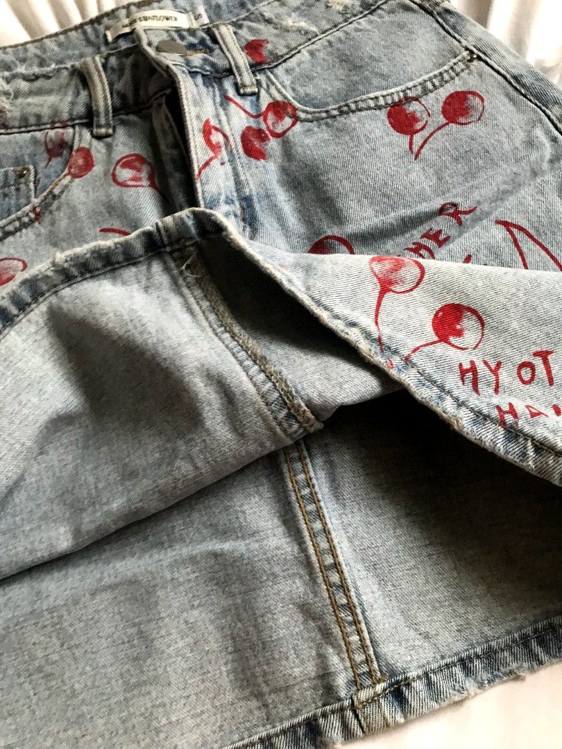 Vintage denim cherry skirt (Category: Skirts) located in Cavite. Submitted by maica_ (Listing ID 1467612695, Image 3). Description: waist: 25 length: 15 no flaws/stain dm to haggle and to sejd a when worn.