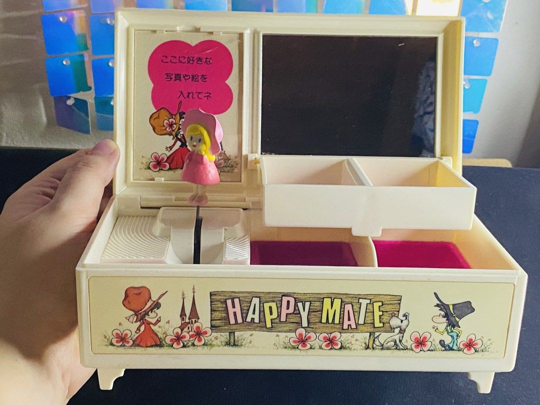 Vintage (Happy Mate) Music Box (Category: Vintage Collectibles) located in Manila. Submitted by kawaii_omocha_est2020 (Listing ID 1467805299, Image 2). Description: Sold As is - Flaw: Has a hairline / stress crack on the inner corner. Please see photo. Yellowing due to age. (Working).
