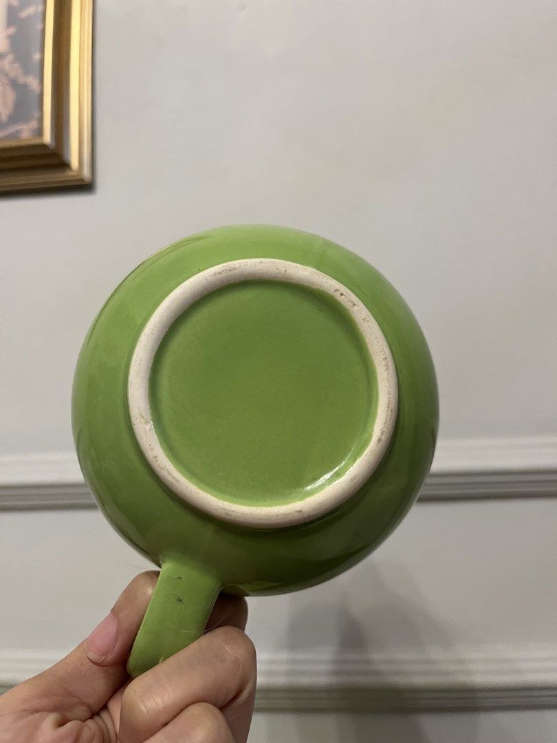 Vintage lime-green or chartreuse ceramic creamer pitcher (Category: Pitchers & Dispensers) located in Quezon City. Submitted by metamerchant (Listing ID 1467740018, Image 3). Description: - Vibrant bright green ceramic pitcher with a glossy glaze finish - Features a sturdy handle and wide pouring spout for easy serving - Stable round flat base with a clean interior - Versatile everyday piece ideal for water, juice, or table flowers - Condition: B