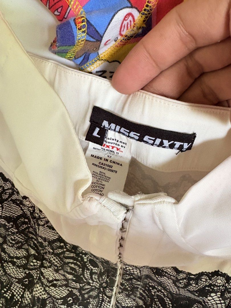 VINTAGE MISS SIXTY CORSET (Category: Sleeveless) located in Manila. Submitted by thriftnicarla08 (Listing ID 1467764503, Image 2). Description: Vintage miss sixty corset top Issue : has small cut inside already stitch not noticable outside.