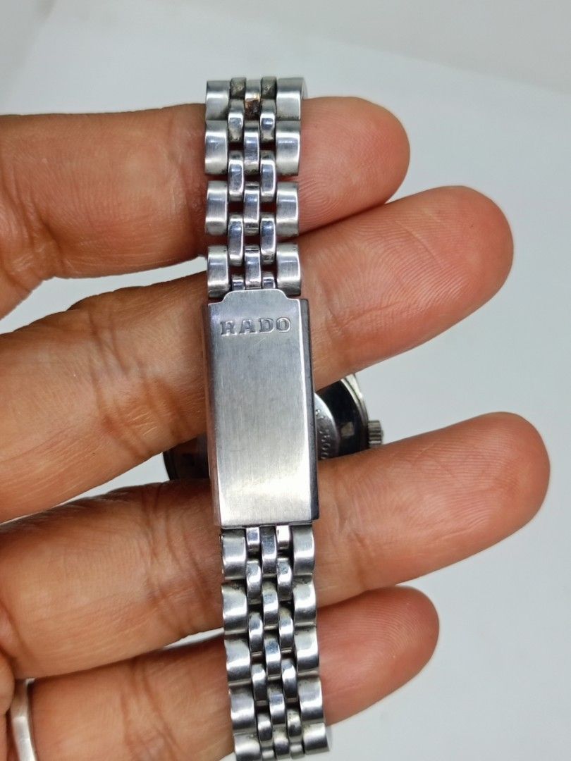 Vintage Rado Voyager Automatic Watch (Category: Luxury Watches) located in Bacoor. Submitted by bibelot03 (Listing ID 1467752340, Image 2). Description: Classic Rado Voyager wristwatch with silver dial and fluted bezel. Date window at three o'clock position. Stainless steel jubilee-style bracelet strap with signed Rado clasp. Case back has the signature seahorse logo and water sealed markings. Swiss made timepiece with silver-tone baton hour mark