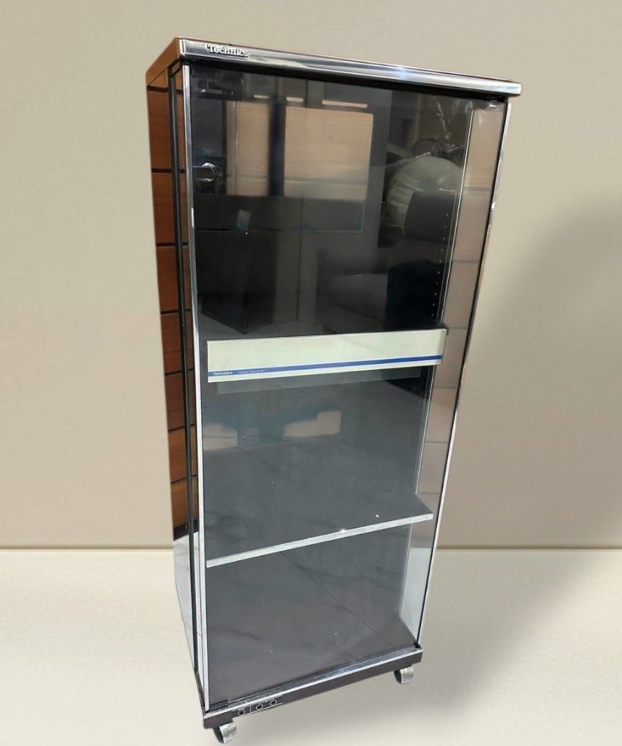 Vintage Rare Technics SH-615 Tower Audio Rack (Category: Other Audio Equipment) located in Quezon City. Submitted by dannikkishoppe2 (Listing ID 1467641461, Image 1). Description: Vintage Rare Technics SH-615 Tower Audio Rack ‼️₱6500‼️ *for component stereo equipments *glass front door *cassette storage rack *built-in caster wheels *with headphone and microphone jacks *good condition W19.5in x D16in x H47.5in Please manage your expectations as th