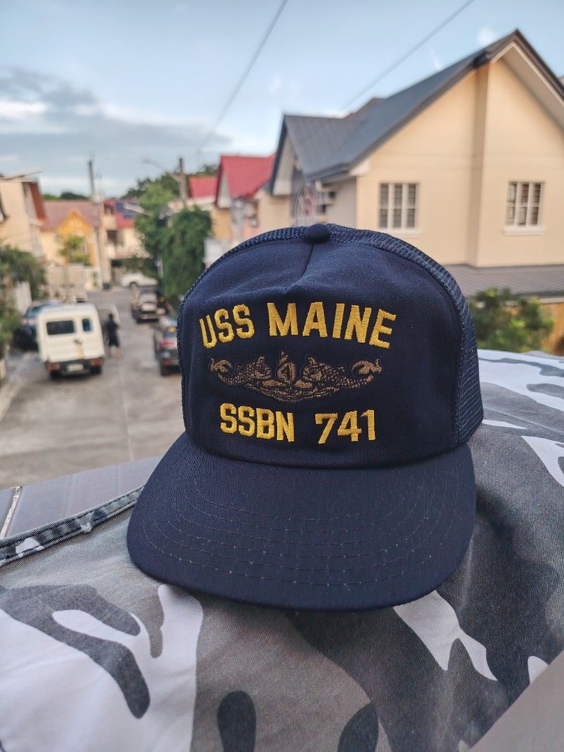 Vintage US Navy Trucker Cap (Category: Caps & Hats) located in Paranaque City. Submitted by prettyboy26 (Listing ID 1467706084, Image 2). Description: VINTAGE US NAVY TRUCKER CAP — USS MAINE (SSBN 741) ⚓️🧢 ​Vintage navy blue mesh-back trucker cap featuring high-density yellow embroidery for the USS Maine (SSBN 741) ballistic missile submarine, complete with the official US Navy Submarine Warfare Insignia. ​Details: Classic structured foam front,
