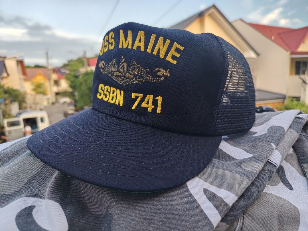 Vintage US Navy Trucker Cap (Category: Caps & Hats) located in Paranaque City. Submitted by prettyboy26 (Listing ID 1467706084, Image 1). Description: VINTAGE US NAVY TRUCKER CAP — USS MAINE (SSBN 741) ⚓️🧢 ​Vintage navy blue mesh-back trucker cap featuring high-density yellow embroidery for the USS Maine (SSBN 741) ballistic missile submarine, complete with the official US Navy Submarine Warfare Insignia. ​Details: Classic structured foam front,