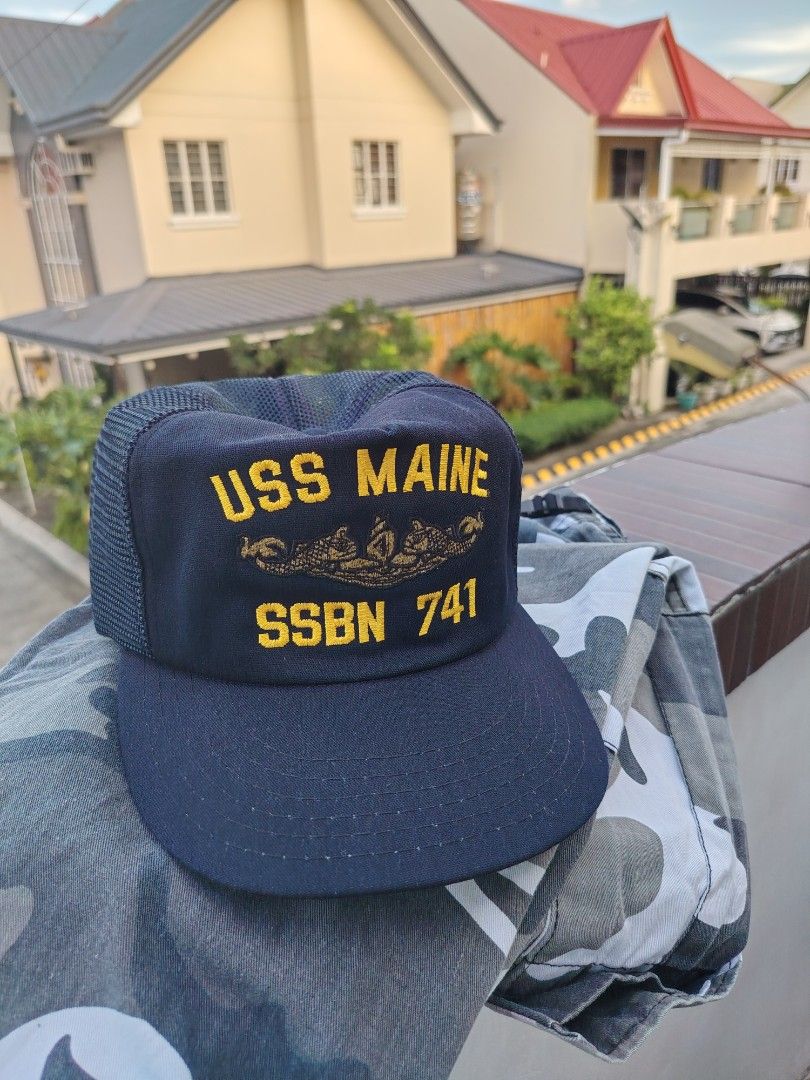 Vintage US Navy Trucker Cap (Category: Caps & Hats) located in Paranaque City. Submitted by prettyboy26 (Listing ID 1467706084, Image 3). Description: VINTAGE US NAVY TRUCKER CAP — USS MAINE (SSBN 741) ⚓️🧢 ​Vintage navy blue mesh-back trucker cap featuring high-density yellow embroidery for the USS Maine (SSBN 741) ballistic missile submarine, complete with the official US Navy Submarine Warfare Insignia. ​Details: Classic structured foam front,