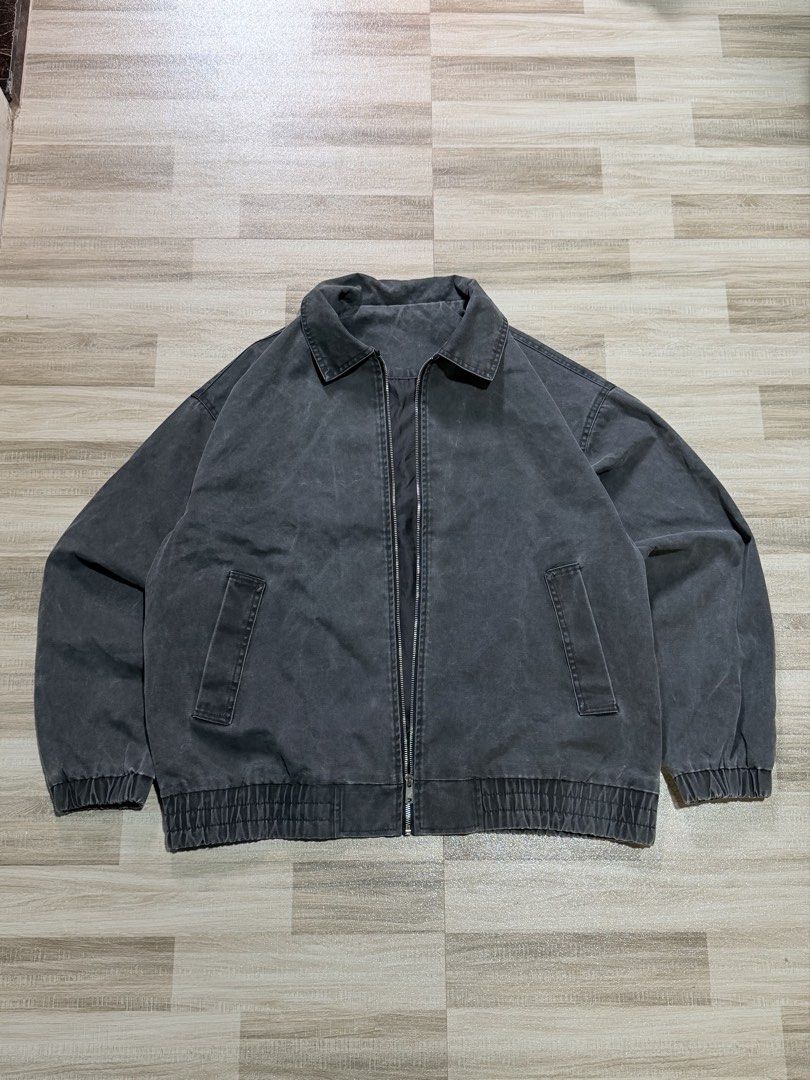 Vintage Washed Black Cotton Zip-Up Bomber Jacket (Category: Coats, Jackets and Outerwear) located in Manila. Submitted by totoygolem69 (Listing ID 1467628596, Image 1). Description: - Color/Finish: Dark grey with a vintage washed finish -Dimension width 24 lenght 28 - Material: Comfortable 100% cotton - Fit: Roomy boxy fit through shoulders and arms - Features: Full front metal zipper, classic fold-down collar, two front welt pockets - Details: S