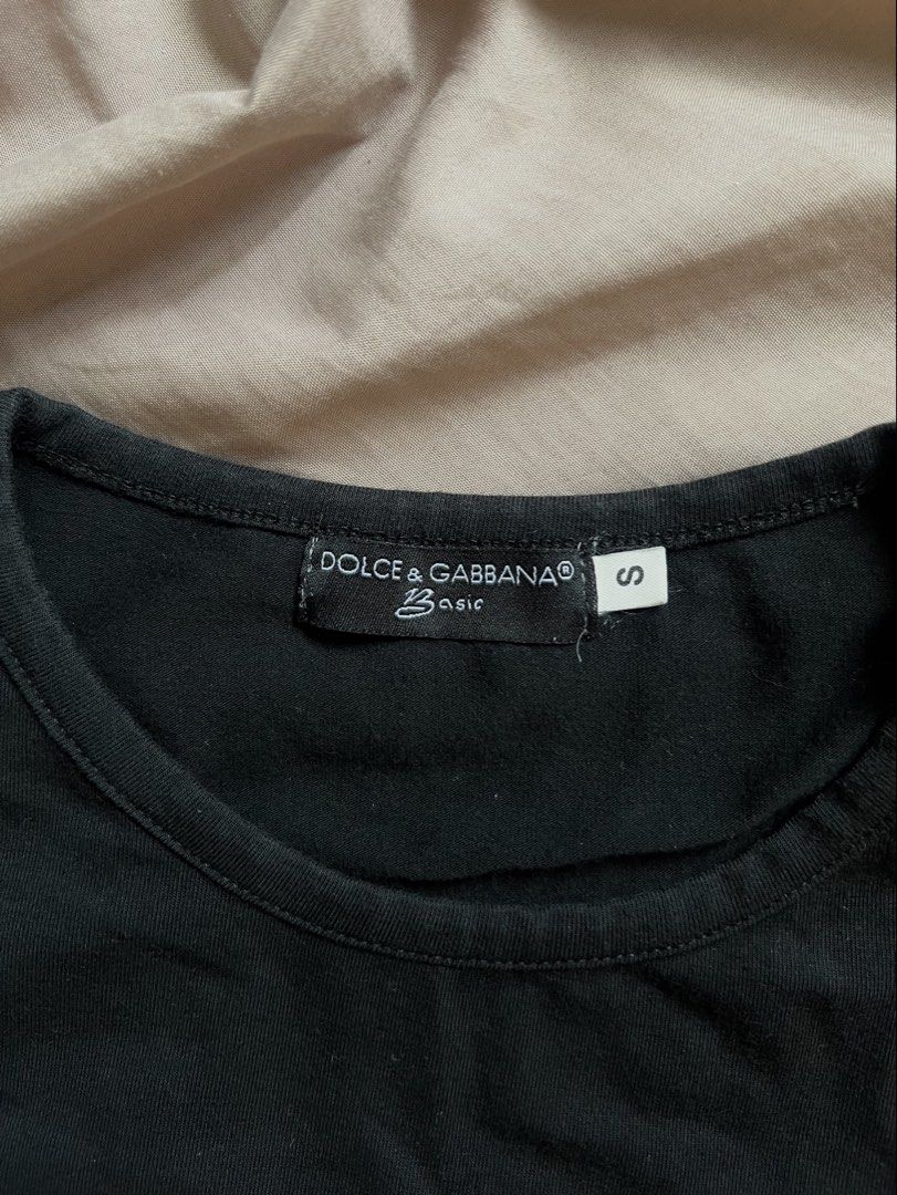 vintage y2k dolce and gabbanna basic tshirt (Category: Shirts) located in Pasig City. Submitted by svgarr (Listing ID 1467664361, Image 3). Description: read bio and caption before buying to save us both time!! fits xs-small some rhinestones have lost their shine and appear dull or discolored, but it’s not very noticeable (see last pic for flaw) 📍iloilo shipping via courier of your choice, sf c/o buyer .