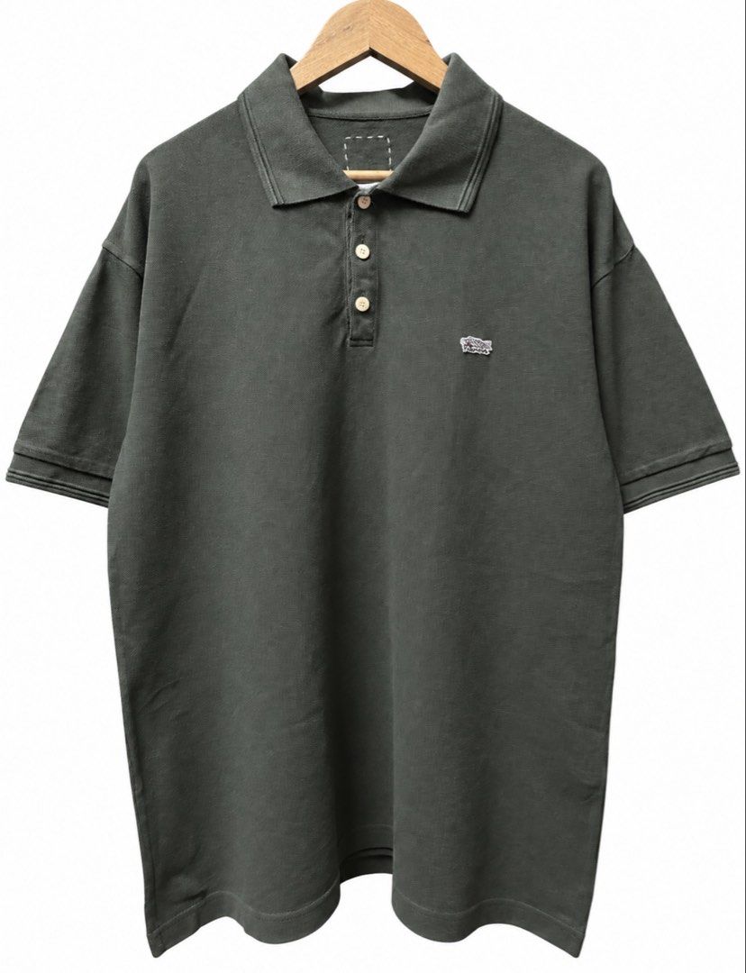 Visvim Jumbo weller Polo shirt (Category: Tshirts & Polo Shirts ) located in Tangub. Submitted by laurbepena33002 (Listing ID 1467794326, Image 1). Description: - Brand/Model: Visvim Polo Shirt - Color: Dark Green - Material: 100% Cotton (Made in Japan) - Details: Small embroidered motif on left chest, 3-button placket with light buttons - Size: Tagged Size 4 - Dimension : W22.5” x L28” .