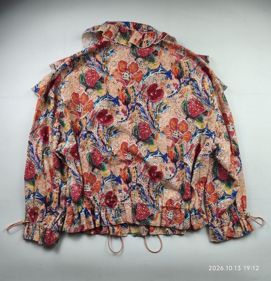 Vivienne tam ruffled - floral zip up jacket (Category: Coats, Jackets and Outerwear) located in Manila. Submitted by corner_finds (Listing ID 1467727819, Image 2). Description: size M on ta pit to pit 20' length 21.5' no flaws 9.5/10 condition 1999+sf dm.