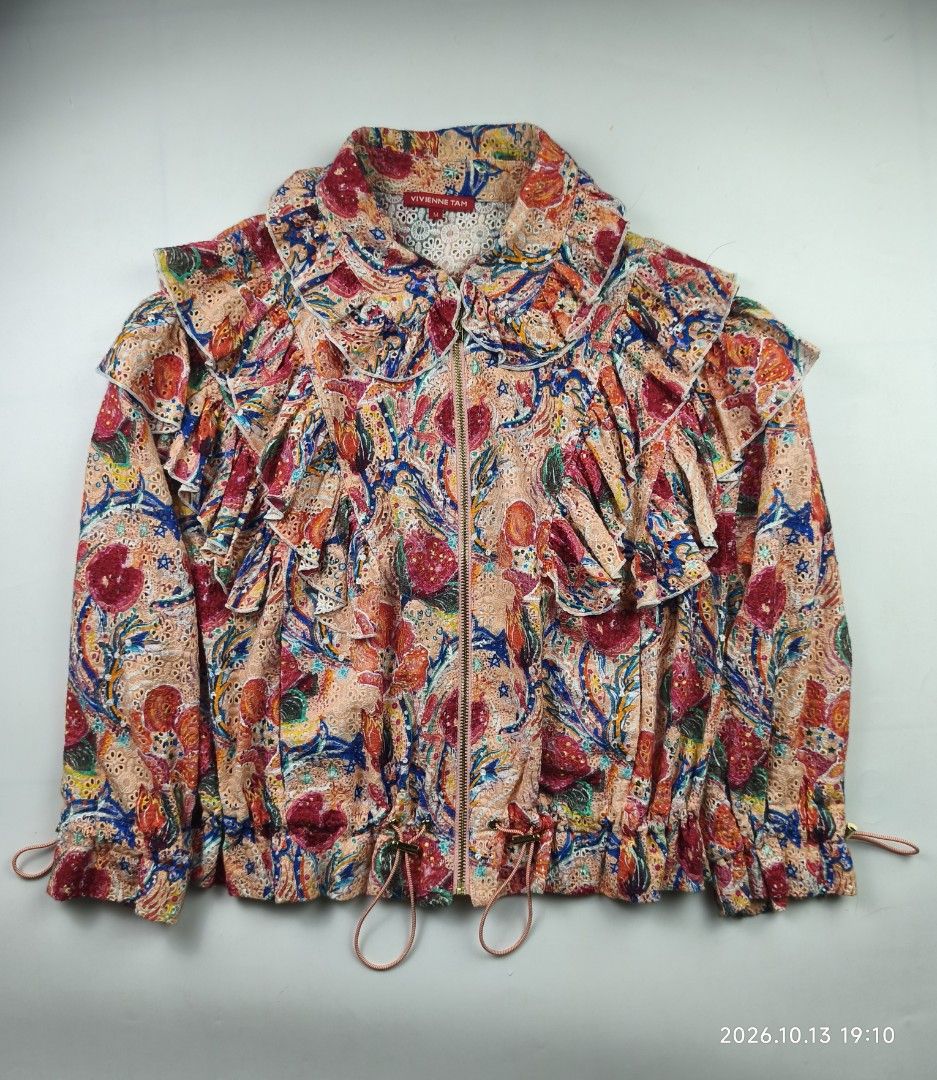 Vivienne tam ruffled - floral zip up jacket (Category: Coats, Jackets and Outerwear) located in Manila. Submitted by corner_finds (Listing ID 1467727819, Image 1). Description: size M on ta pit to pit 20' length 21.5' no flaws 9.5/10 condition 1999+sf dm.