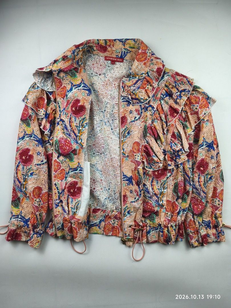 Vivienne tam ruffled - floral zip up jacket (Category: Coats, Jackets and Outerwear) located in Manila. Submitted by corner_finds (Listing ID 1467727819, Image 3). Description: size M on ta pit to pit 20' length 21.5' no flaws 9.5/10 condition 1999+sf dm.
