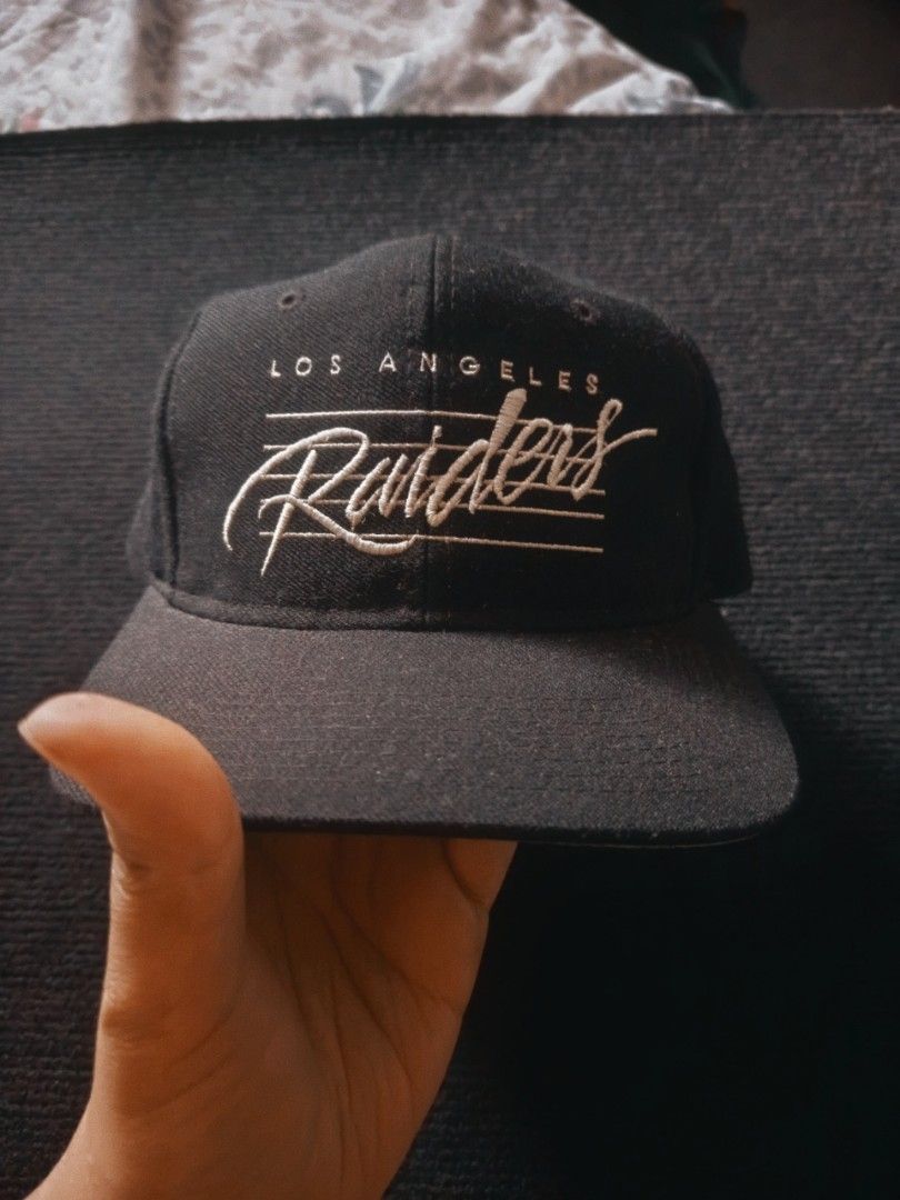 VTG los Angeles raiders "Strings" snapback hat (Category: Caps & Hats) located in Baguio. Submitted by UrbanFlip (Listing ID 1467828382, Image 1). Description: legit 💯 NWA raphat (Dr dre, ice cube and eazye. mcren doesn't wear this design) wool color rate 9.5/10 condi 10/10 all details given rfs: not in use got 2x in my collection yes price is stated for a rare hat not in a rush :).