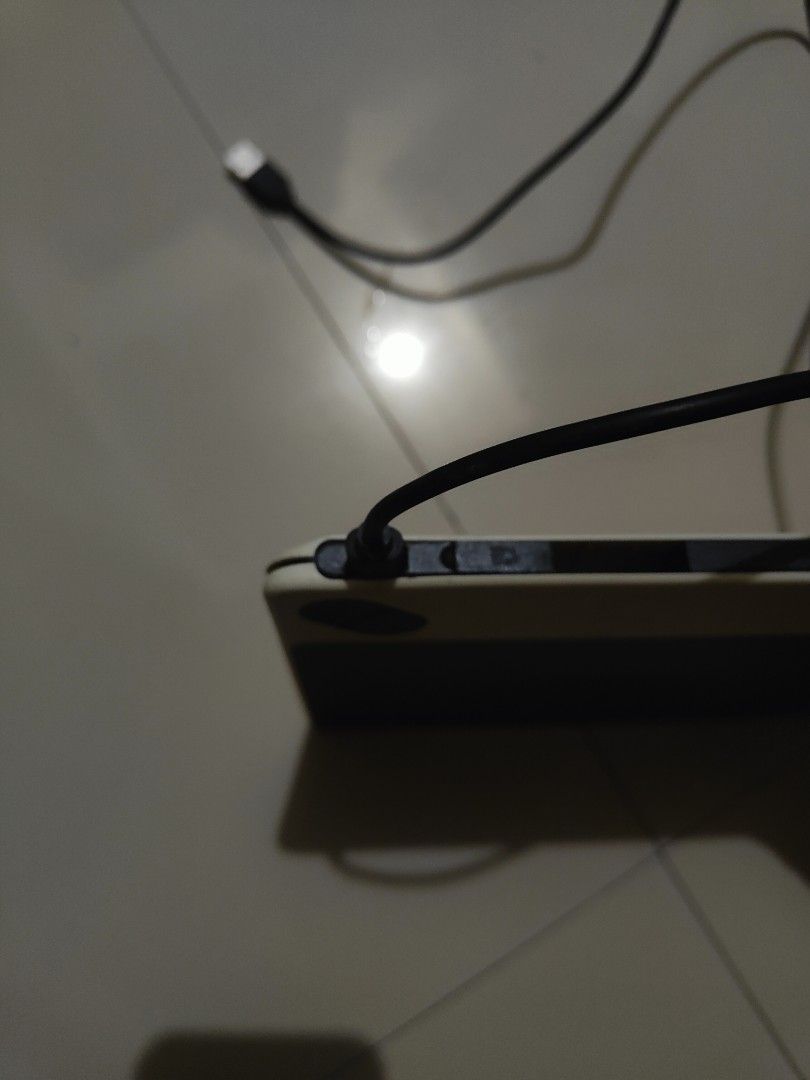 Wacom Drawing Tablet with USB Cable (Category: Laptops & Notebooks) located in Manila. Submitted by jojemar890 (Listing ID 1467699755, Image 2). Description: - Model: Wacom Drawing Tablet (Black & White) - Connectivity: Attached USB cable with standard connector for direct plug-and-play - Condition: Active drawing surface shows minor signs of use - Features: Two physical buttons at the top for quick access - Stability: Equipped with rubber feet o