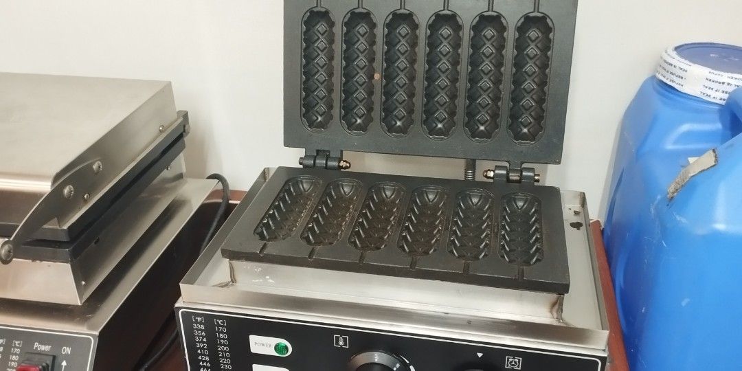 Waffle Machine & Warmer Cabinet (Category: Coffee Machines & Makers) located in Quezon City. Submitted by tabitha.declutter (Listing ID 1467748420, Image 1). Description: price posted for 2- waffle machine & food warmer rfs: change business pick up: Friday 4pm where: GSIS Main, Pasay City.