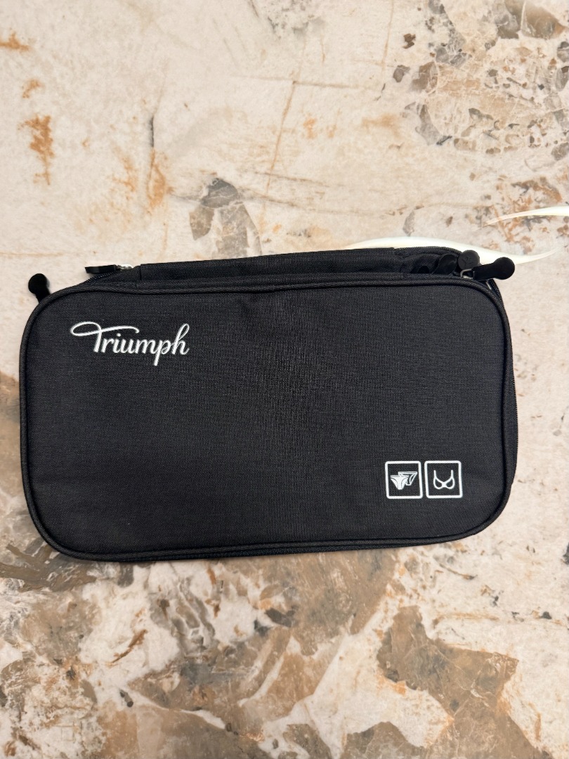 TRIUMPH MULTI-LAYER & FUNCTIONAL TRAVEL ORGANIZER (Category: Travel Essentials & Accessories) located in Makati City. Submitted by fpled (Listing ID 1465245289, Image 1). Description: ✨ BRAND NEW OFFICIAL TRIUMPH MULTI-LAYER TRAVEL ORGANIZER ✨ Water-Resistant • 3-Compartment Travel Pouch / Tech Bag / Toiletry Kit) Unisex, heavy-duty 3-layer travel pouch designed for maximum storage and organization! Features durable water-resistant polyester fabr