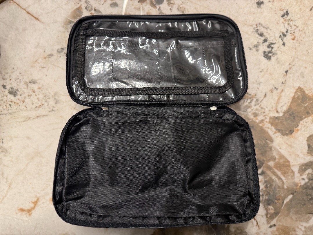 TRIUMPH MULTI-LAYER & FUNCTIONAL TRAVEL ORGANIZER (Category: Travel Essentials & Accessories) located in Makati City. Submitted by fpled (Listing ID 1465245289, Image 2). Description: ✨ BRAND NEW OFFICIAL TRIUMPH MULTI-LAYER TRAVEL ORGANIZER ✨ Water-Resistant • 3-Compartment Travel Pouch / Tech Bag / Toiletry Kit) Unisex, heavy-duty 3-layer travel pouch designed for maximum storage and organization! Features durable water-resistant polyester fabr