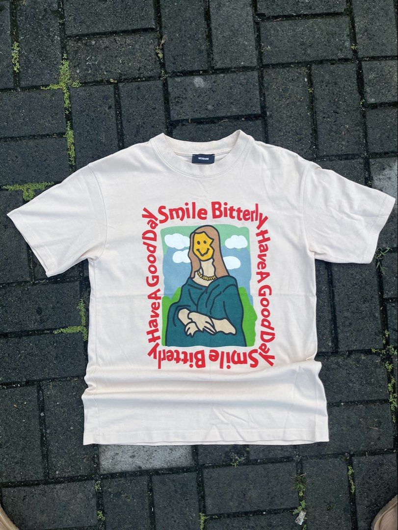 WE11DONE GRAPHIC TEE (Category: Tshirts & Polo Shirts ) located in Manila. Submitted by mikko. (Listing ID 1467728008, Image 1). Description: WELLDONE GRAPHIC TEE CREAM COLORED SHORT SLEEVE MONA LISA WITH SMILEY FACE AS NEW CONDITION NO ISSUE MADE IN KOREA ARCHIVE PIECE COMPLETE TAGS SMALL ON TAG W - 18 L - 27 PM PM.