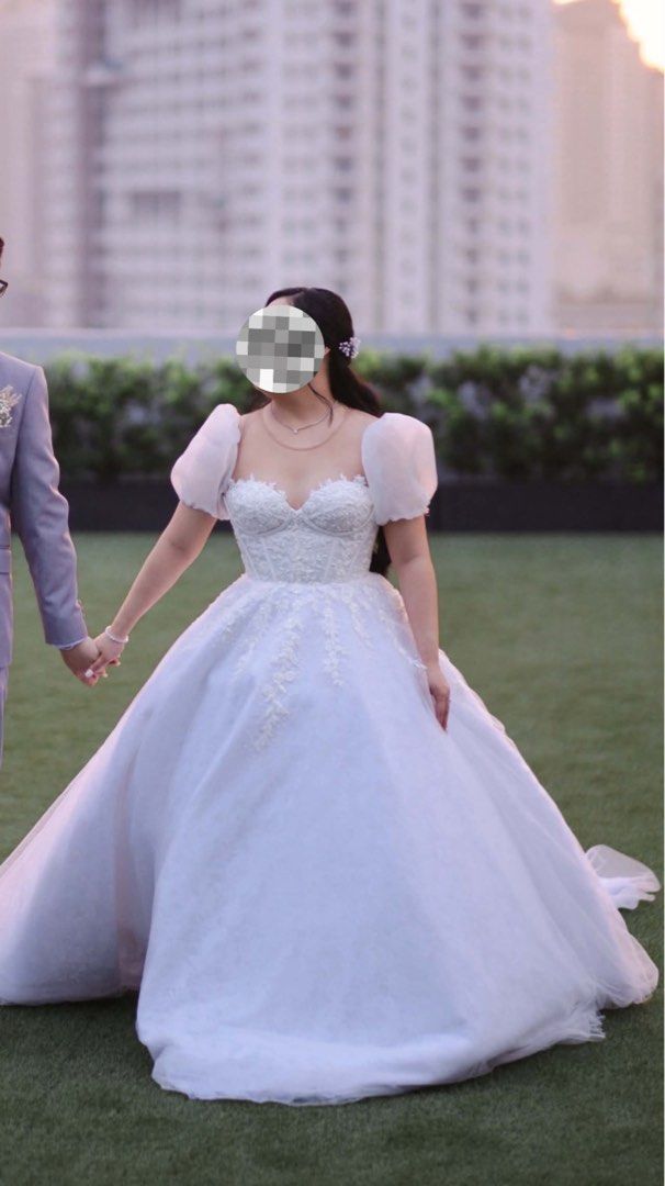 WEDDING GOWN (Category: Dresses) located in Manila. Submitted by eryyy.ycb (Listing ID 1467635433, Image 2). Description: 👰 Custom Wedding Gown for Sale (Medium–Large) — Ready for Next Bride! Selling my beautiful custom wedding gown because it’s time for it to bring joy to another bride on her big day! 🤍 Carefully loved, worn once, and professionally dry-cleaned. It’s practically brand new with no flaws ✨ Details & Sizing: 🔘Size: Best fits Med