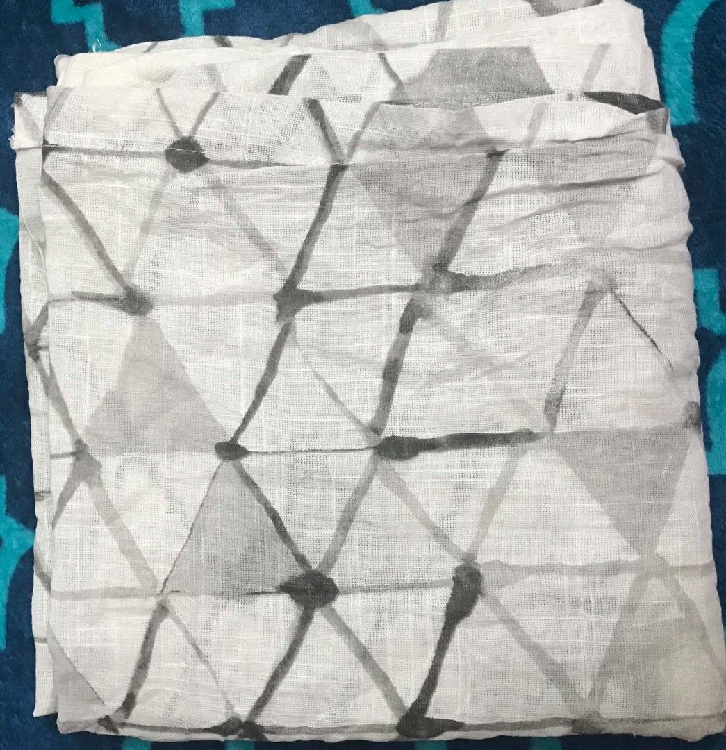 West Elm geometric print cotton curtain 1 panel (Category: Curtains & Blinds) located in Imus. Submitted by stop_shop7 (Listing ID 1467624342, Image 2). Description: - Brand: West Elm - Design: White fabric with grey geometric triangle pattern - Material: 100% cotton with a nice textured gauze feel - Size: 48 x 84 inches - Origin: Made in Pakistan .